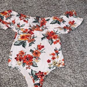 Over the shoulder body suit